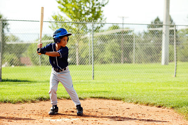 A youth league player up to the plate